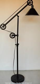 Contemporary Industrial Style Adjustable Floor Lamp with Pulleys. 