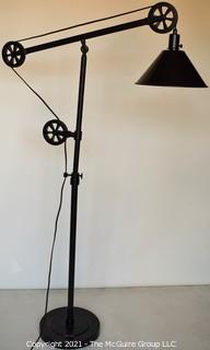 Contemporary Industrial Style Adjustable Floor Lamp with Pulleys. 