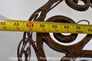 Contemporary Scroll Metalwork Garden Table.  Measures 38" tall x 15" in diameter. 