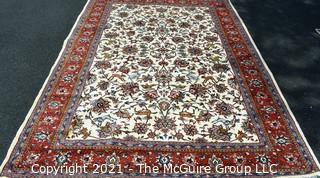 Hand Woven Persian Wool Rug with Botanical Design on White Ground with Red Border.  Measures 87" x 120"