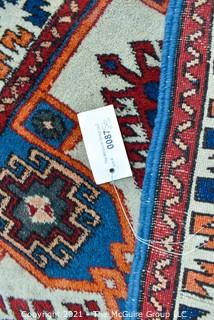 Hand Woven Persian Rug with Geometric Pattern. Measures approximately 26" x 49".