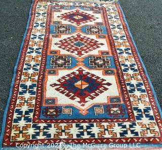 Hand Woven Persian Rug with Geometric Pattern. Measures approximately 26" x 49".