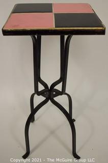 Vintage Wrought Iron Table with Pink and Black Tile Insert. Measures 19" tall and and 9" square.