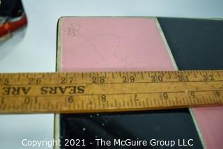 Vintage Wrought Iron Table with Pink and Black Tile Insert. Measures 19" tall and and 9" square.