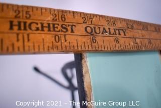 Vintage Wrought Iron Table with Turquoise and Black Tile Insert.  Measures 18" tall, 19" long and 9" wide.