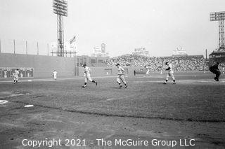 Rickerby(?): Negatives Only:  Red Sox Fans swarm bus and Yankees at Fenway Park c 1961