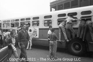 Rickerby(?): Negatives Only:  Red Sox Fans swarm bus and Yankees at Fenway Park c 1961