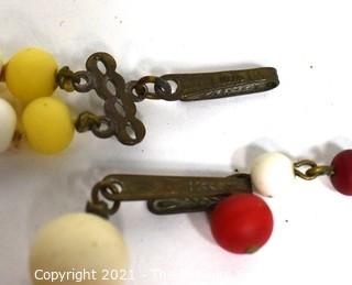 Two (2) Matching Sets Demi Parure in Yellow & Red Porcelain Beads.  Includes Adjustible Necklaces & Clip On Earrings.  Made in Japan. 