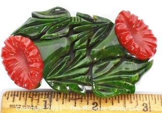 Vintage Green & Red Carved Bakelite Flower Brooch.  Measures 3" long. 