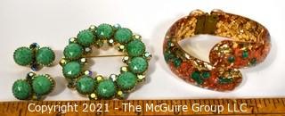 Group of Mid Century Vintage Jewelry.  Includes faceted Rhinestone Circle Brooch with Matching Clip On Earrings and Lucite Hinged Cuff Bracelet with Gold Confetti Glitter. 