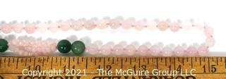 Opera Length Knotted Pink & Green Gemstone Beaded Necklace.  Measure 30" long.