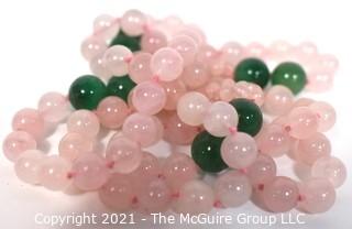 Opera Length Knotted Pink & Green Gemstone Beaded Necklace.  Measure 30" long.