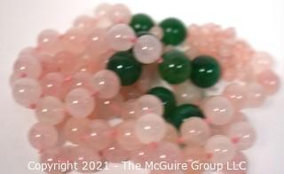 Opera Length Knotted Pink & Green Gemstone Beaded Necklace.  Measure 30" long.