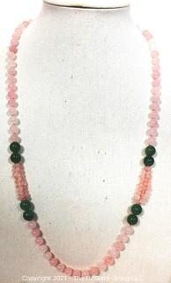 Opera Length Knotted Pink & Green Gemstone Beaded Necklace.  Measure 30" long.