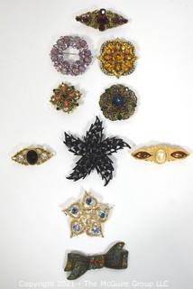 Group of Vintage Rhinestone Brooches. Includes Trifari. 