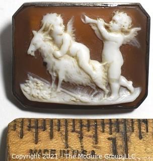 Antique Victorian Hand Carved Shell Cameo Brooch Set In Silver with Cherubs and a Goat.  Measures 1 1/4" x 1" 