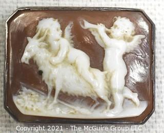 Antique Victorian Hand Carved Shell Cameo Brooch Set In Silver with Cherubs and a Goat.  Measures 1 1/4" x 1" 