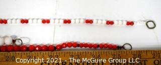 Three (3) Strands of Red & White Faceted Beads.  