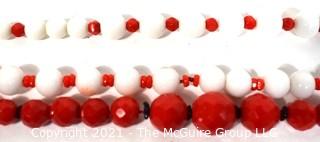 Three (3) Strands of Red & White Faceted Beads.  