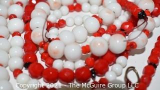 Three (3) Strands of Red & White Faceted Beads.  