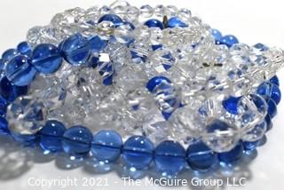 Four (4) Strands of Clear and Cobalt Blue Crystal Faceted Beads. 