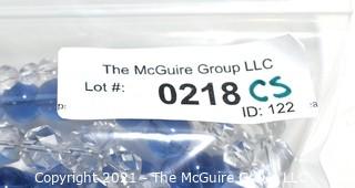 Four (4) Strands of Clear and Cobalt Blue Crystal Faceted Beads. 