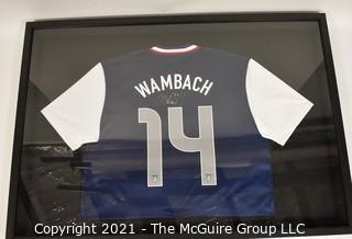 Framed and Professionally Mounted Signed Abby Wambach Team USA Women's Soccer Olympic Jersey.  Signed in Black Sharpie with her U.S. Olympic Team #20