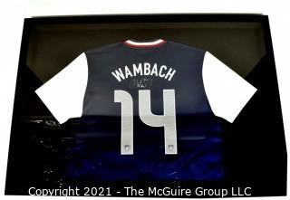 Framed and Professionally Mounted Signed Abby Wambach Team USA Women's Soccer Olympic Jersey.  Signed in Black Sharpie with her U.S. Olympic Team #20