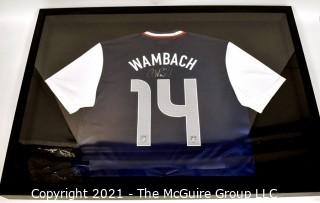 Framed and Professionally Mounted Signed Abby Wambach Team USA Women's Soccer Olympic Jersey.  Signed in Black Sharpie with her U.S. Olympic Team #20