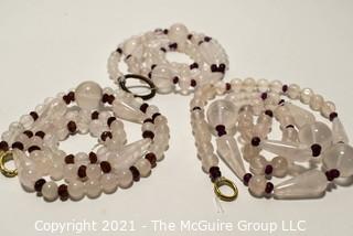 Three (3) Strands of Rose Quarts and Faceted Garnet Beads. 