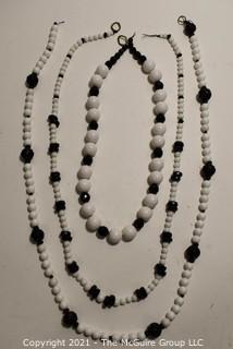 Three (3) Strands of Glass & Plastic Beads in White & Black 