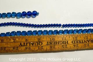 Three (3) Strands of Blue Glass Beads. 