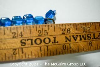 Three (3) Strands of Blue Glass Beads. 