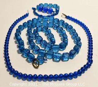 Three (3) Strands of Blue Glass Beads. 