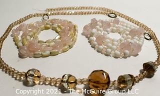 Three (3) Strands of Amber Glass and Rose Quartz Beads. 