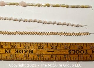 Three (3) Strands of Amber Glass and Rose Quartz Beads. 