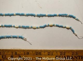 Three (3) Strands of Blue Glass and Mother of Pearl Beads. 