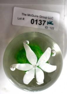 Vintage Round Hand Blown Lampwork Glass Paperweight with White & Green Flower. Measures 3" in diameter.