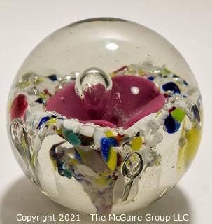 Vintage Round Hand Blown Lampwork Glass Paperweight with Pink Flower. Measures 3" in diameter.