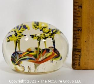 Vintage Round Hand Blown Lampwork Glass Paperweight with Yellow Flowers. Measures 3" in diameter.