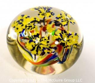 Vintage Round Hand Blown Lampwork Glass Paperweight with Yellow Flowers. Measures 3" in diameter.