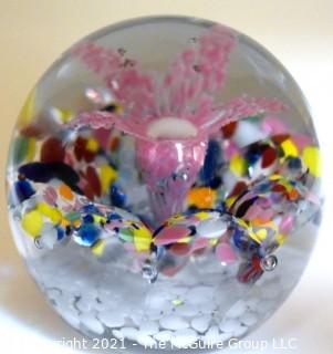 Vintage Round Hand Blown Lampwork Glass Paperweight with Pink Flower. Measures 3" in diameter.