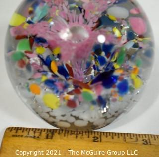 Vintage Round Hand Blown Lampwork Glass Paperweight with Pink Flower. Measures 3" in diameter.