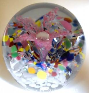 Vintage Round Hand Blown Lampwork Glass Paperweight with Pink Flower. Measures 3" in diameter.