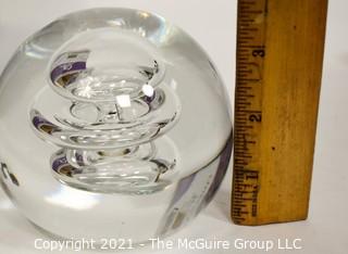 Vintage Round Hand Blown Clear Glass Paperweight with Bubbles. Measures 4" in diameter.