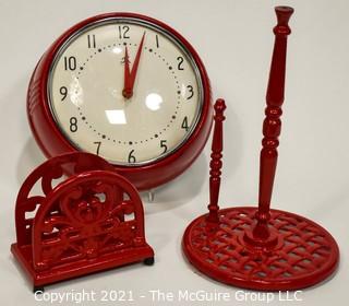 Three (3) Red Kitchen Items Including Wall Clock, Paper Towel Dispenser and Napkin Holder. 