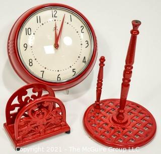 Three (3) Red Kitchen Items Including Wall Clock, Paper Towel Dispenser and Napkin Holder. 