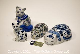 Four (4) Blue and White Painted Porcelain Cats Figurines.  