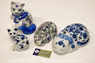 Four (4) Blue and White Painted Porcelain Cats Figurines.  