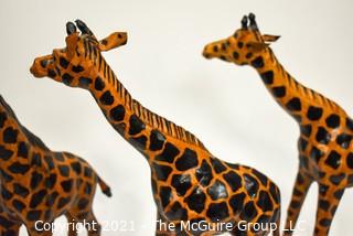 Group of Three Carved Wooden Giraffes. 